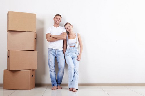Professional flat removals team planning a Wimbledon apartment move