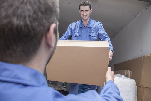 Moving van and packed furniture for a Wimbledon relocation