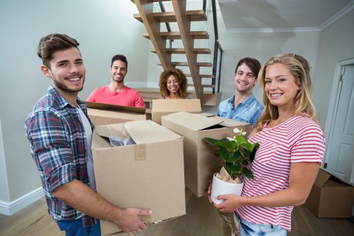 Removal team preparing a move in Wimbledon near residential properties
