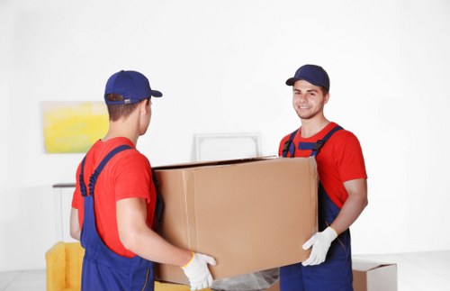 Man with van service loading furniture in Wimbledon