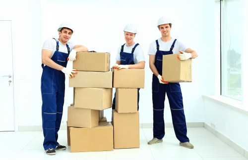 Professional man and van service protecting items during transport