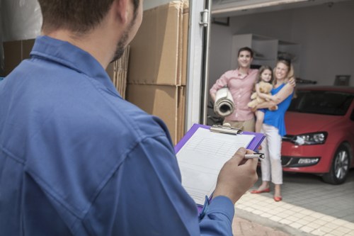 Commercial movers organizing office furniture during relocation