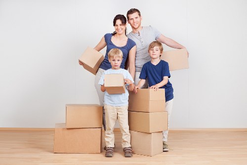 Packed office equipment ready for relocation in Wimbledon