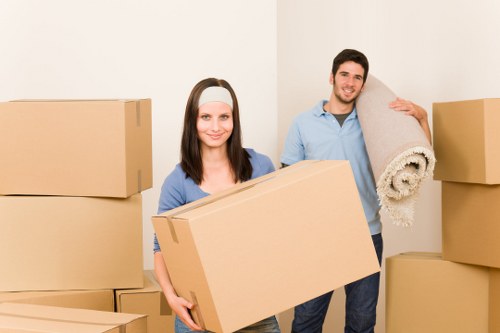 Packed boxes and furniture loaded into a moving truck for a house move