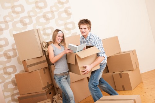 Packed business boxes and workstations ready for transport